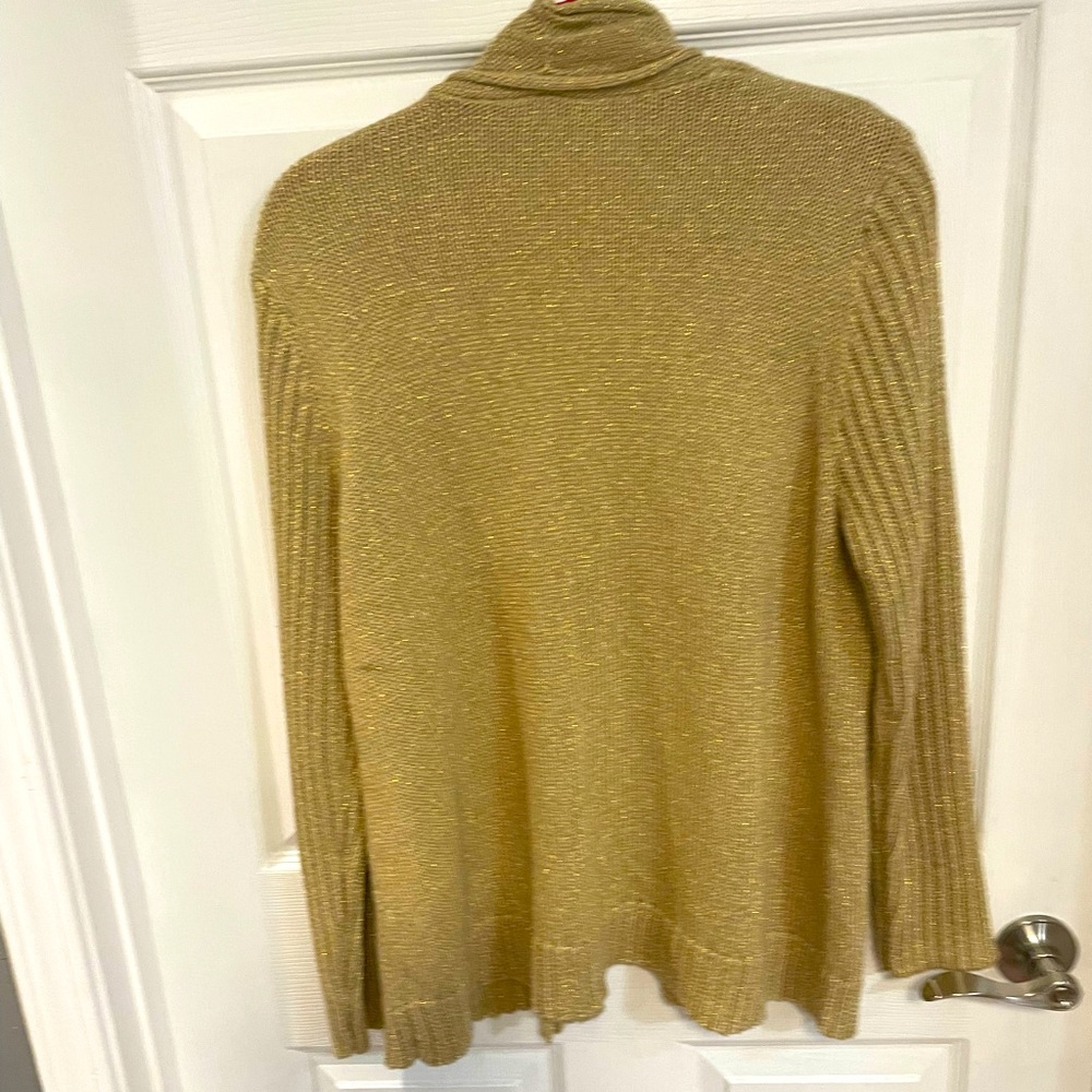 Chico sweater cardigan.  Has soft feel.   Acrylic Cotton Poly.  48”